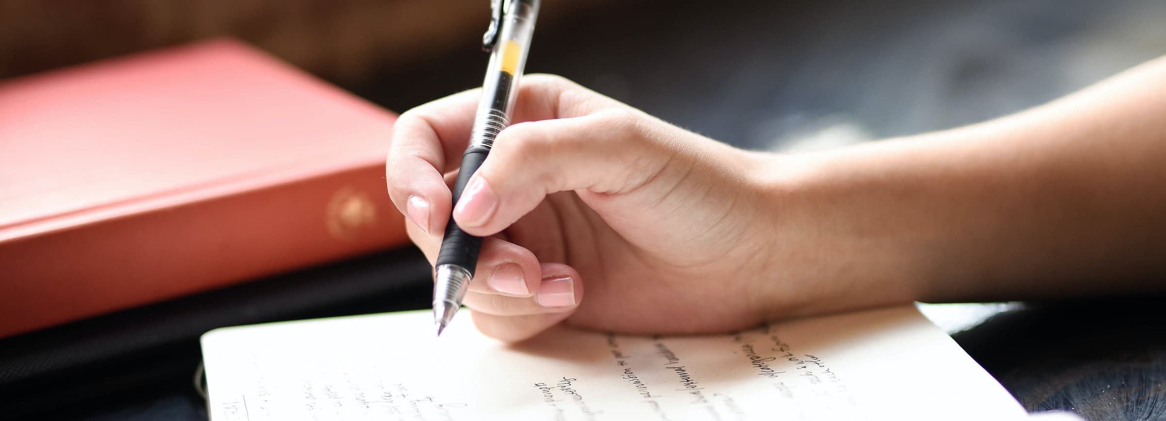 Person writing in a journal